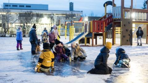 Hólabrekkuskóli in Breiðholt, children playing outside.
